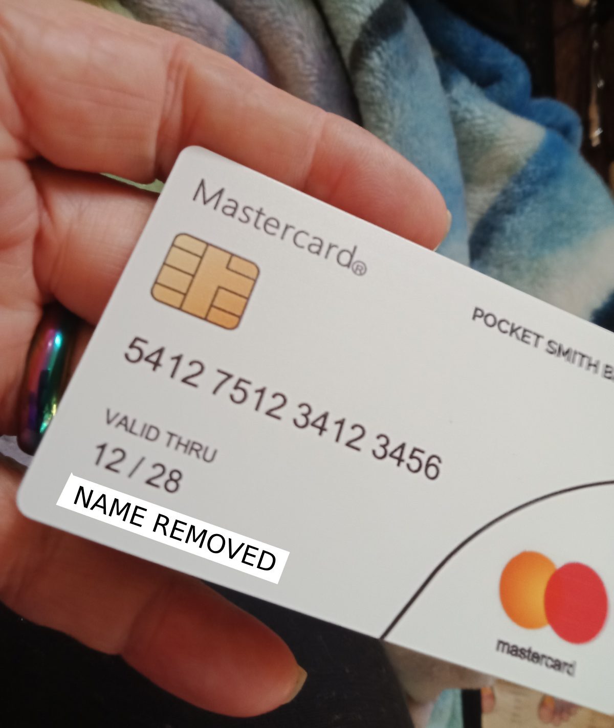 Fake Mastercard produced by scammers, with 'POCKET SMITH BANK' on the card